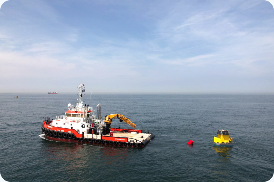 boat at sea near a floating buoy